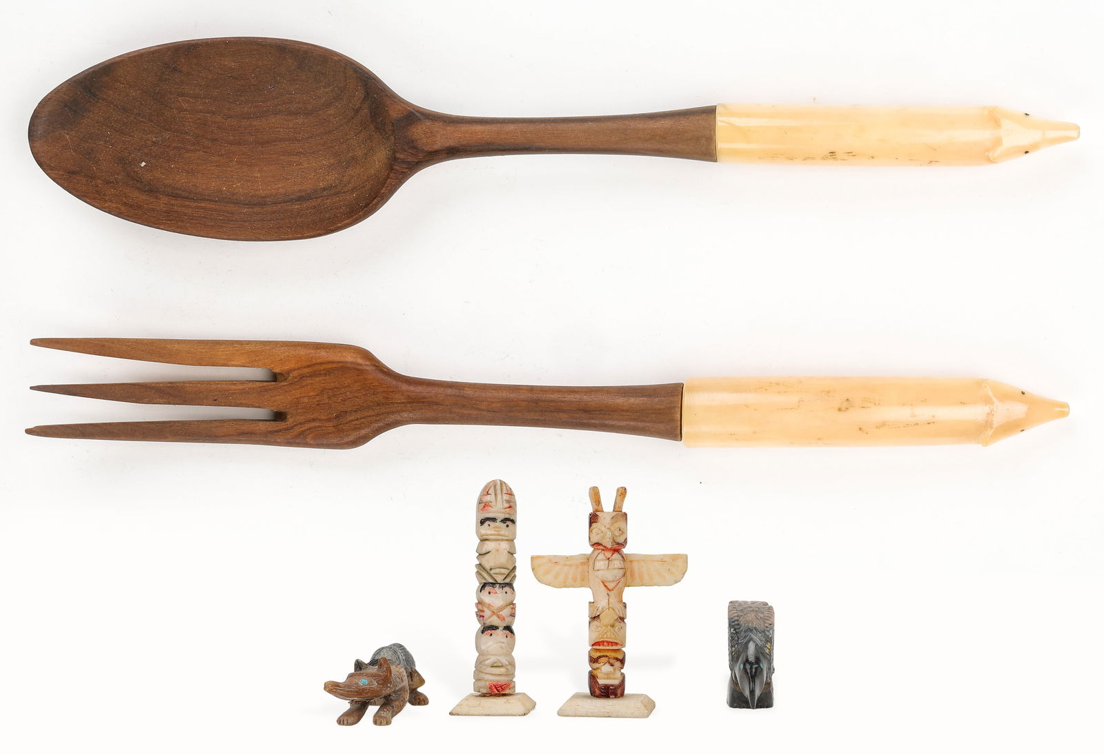 Collector's Lot of 6 Pacific Northwest And Inuit Items: Collector's Lot of 6 Pacific Northwest And Inuit Items. Including: an Inuit carved wood and bone Fork and Spoon Set with Polar Bear Head Handle Ends. Each Length: 10'' (25 cm). Together with 4 Miniatu