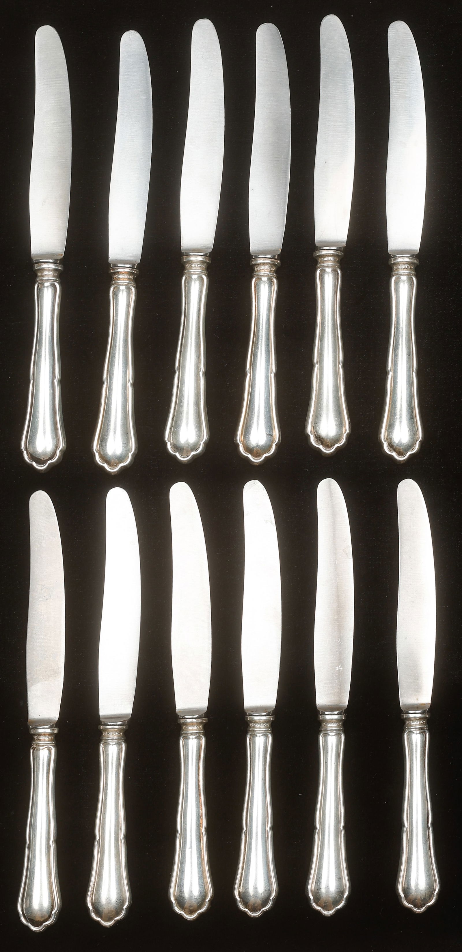 Set Of 12 German Marked "Nicht Rostend" .800 Silver Knives: Set Of 12 German Marked "Nicht Rostend" .800 Silver Knives With Steel Blades. Each Size: 9.5'' x 1'' (24 x 3 cm). Total Weight: 28.5 ozt.