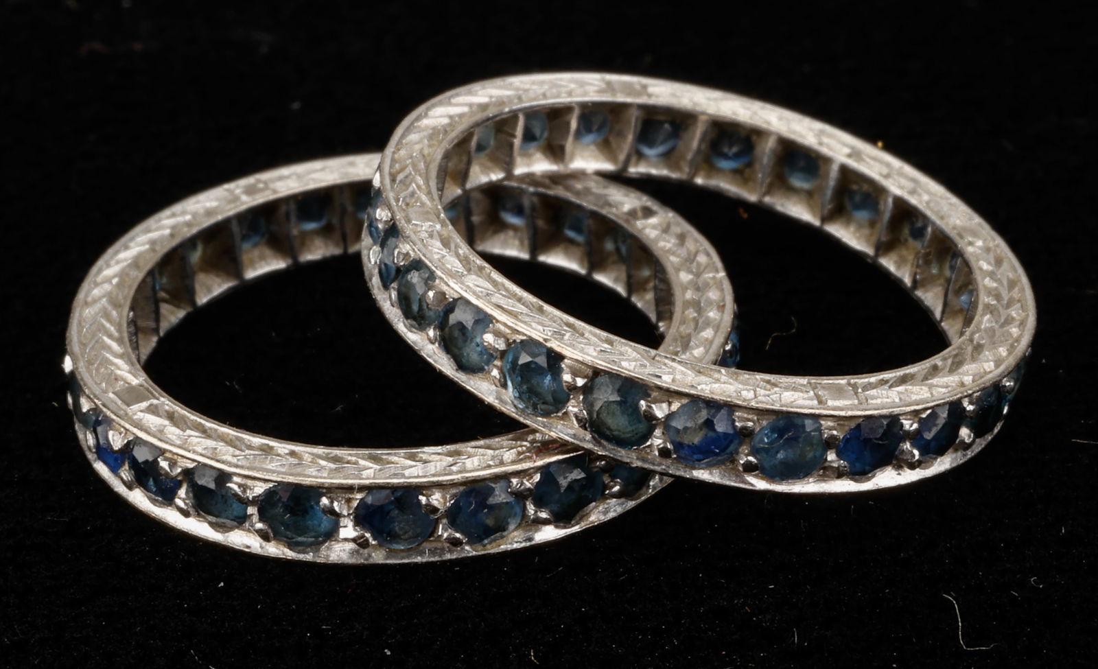 2 Vintage 14K White Gold Sapphire Eternity Band Rings: 2 Vintage 14K White Gold Sapphire Eternity Band Rings. Size: 5.5. Gemstones have not been weighed, graded for color and clarity, or tested. Total Weight: 4.2g
