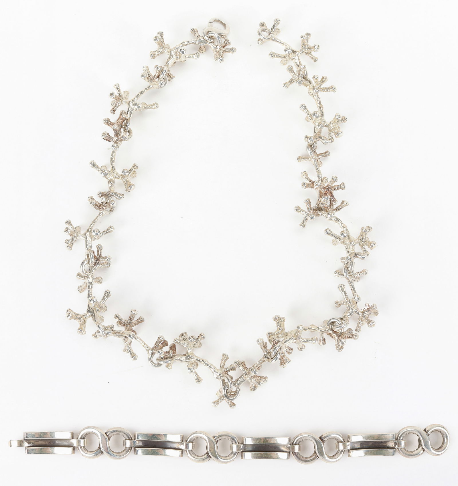 Silver Necklace And Bracelet: Silver Necklace And Bracelet. 1) Unusual Silver On Bronze Grape Stems Necklace. Studio Piece cast from Eaten Grapes Bunch. Stamped: .925. Size: Length: 17" (43 cm). Total weight: 136 g. 2) Georg