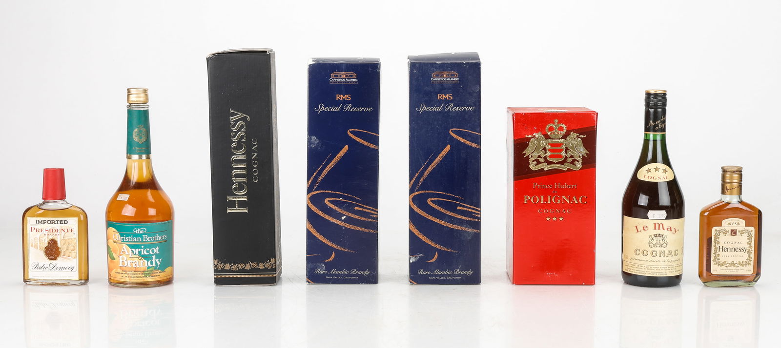 Eight Bottles of Various Cognac and Brandy: Eight Bottles of Various Cognac and Brandy. Including: Presidente (Brandy), Hennessy V.S. (Cognac), Hennessy Bras D'or (Cognac) (with box), 1990-2002, Carneros Alambic R.M.S. (Brandy) (with box) x2, P