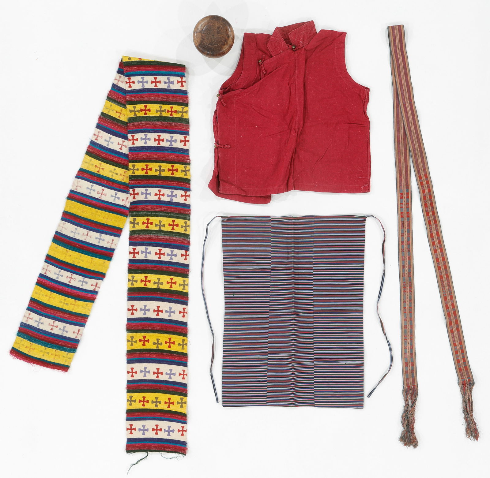Group of Five Tibetan Pieces: Group of Five Tibetan Pieces from McLeod Gang, India. Lot includes a woman's cotton apron, wool scarf, man's, possibly for a monk, cotton vest with buttons, a belt, and a burl wood lidded bowl for dri
