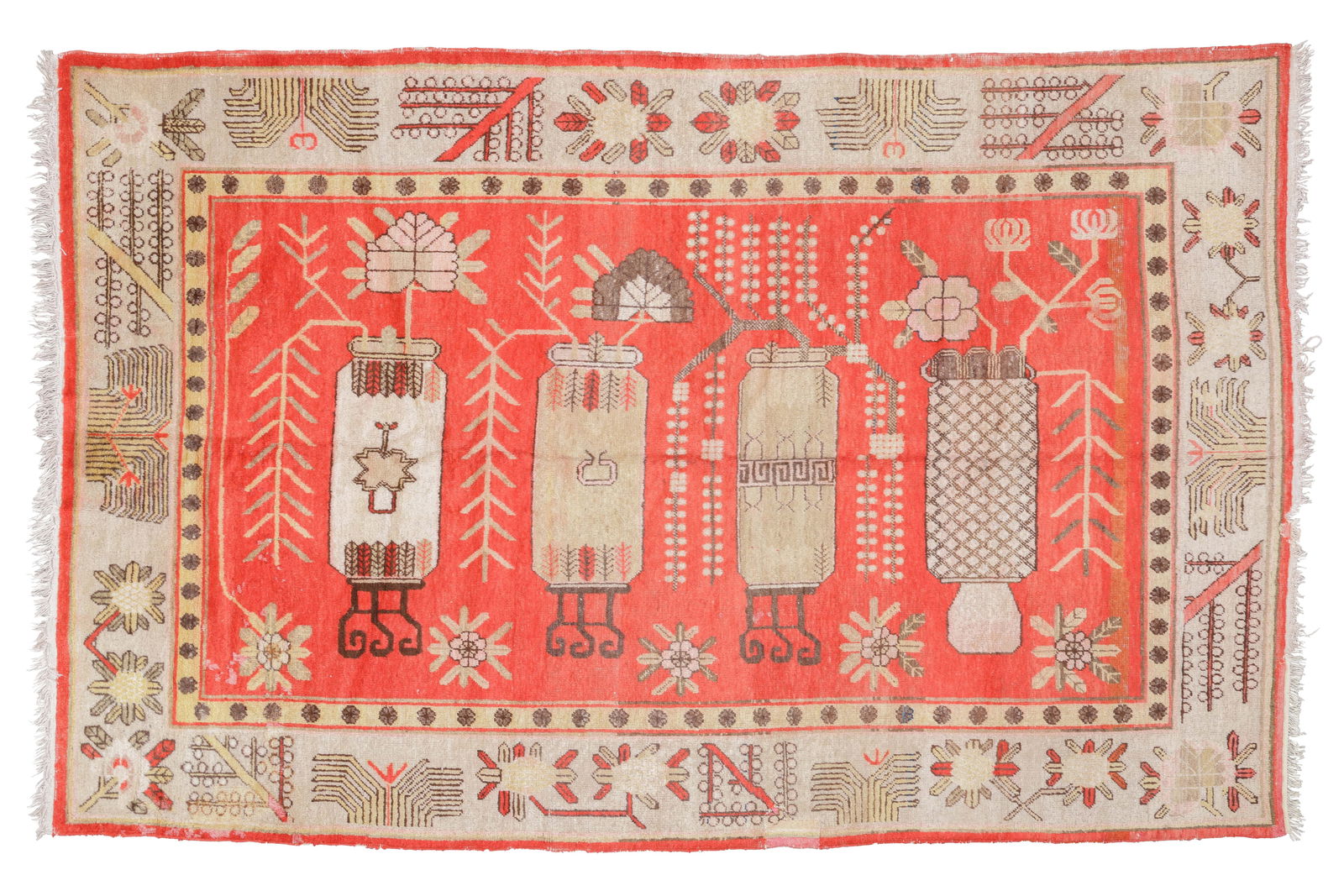 Khotan Rug, East Turkestan, Early/Mid 20th C., 5'7'' x 8'9'': Khotan Rug, East Turkestan, Early/Mid 20th C., 5'7'' x 8'9'' (170 x 267 cm). Weight: 19 lbs. Material: wool pile, cotton warp, cotton weft.