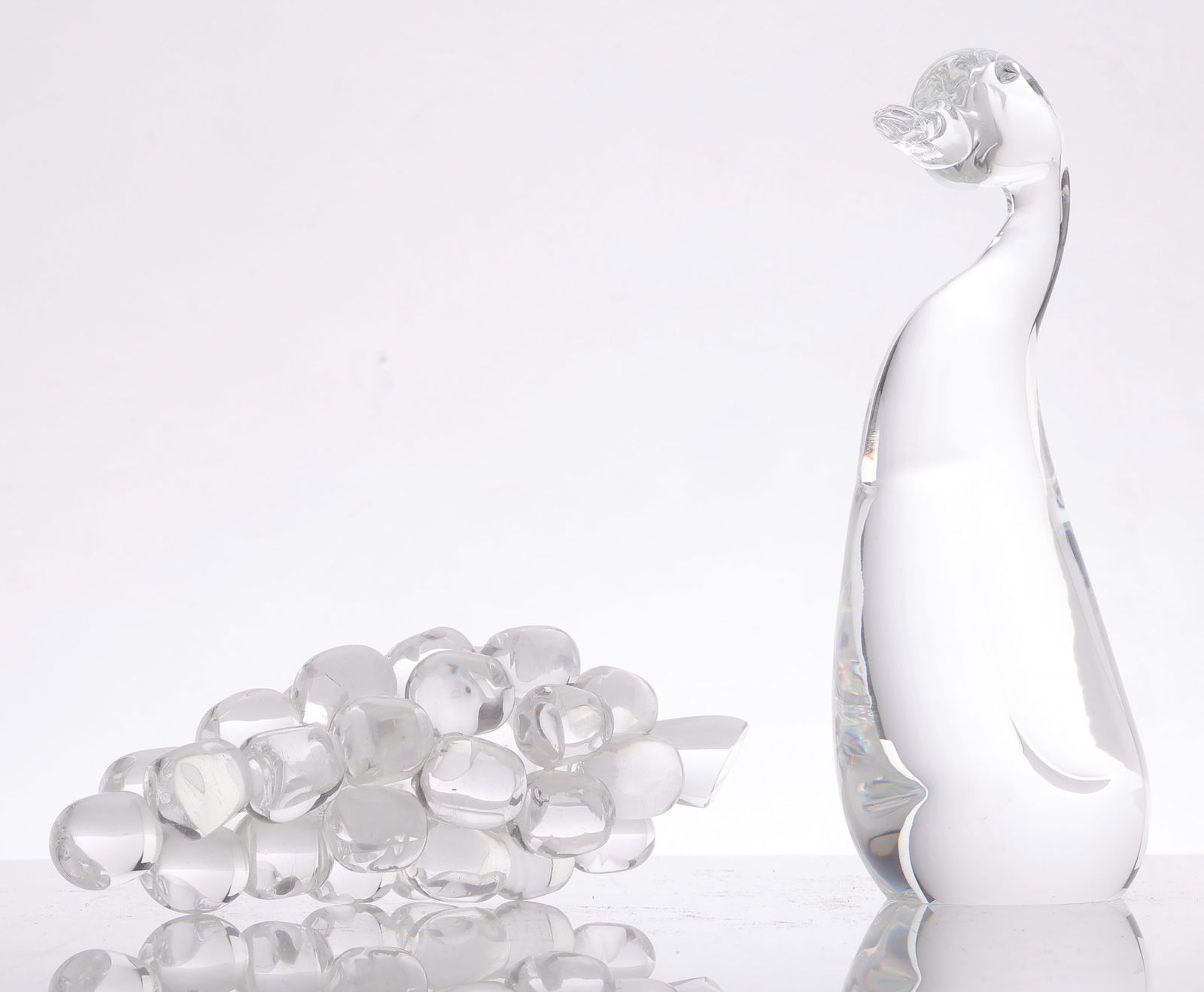 Steuben Glass Grapes and Duck: Steuben Glass Grapes and Duck, Signed. Sizes: 1) 2.5'' x 7'' x 2.5'' (6 x 18 x 6 cm); 2) 8'' x 3.5'' x 2.5'' (20 x 9 x 6 cm).