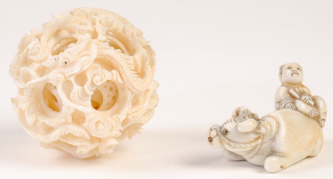 2 Composite Items- Oxen Netsuke and Carved Mystery Bal: 2 Composite Items- Oxen Netsuke and Carved Mystery Ball. Sizes: 1) 1.25" x 2" x 1", 2) 2" in diameter. From the collection of a Pennsylvania gentleman.