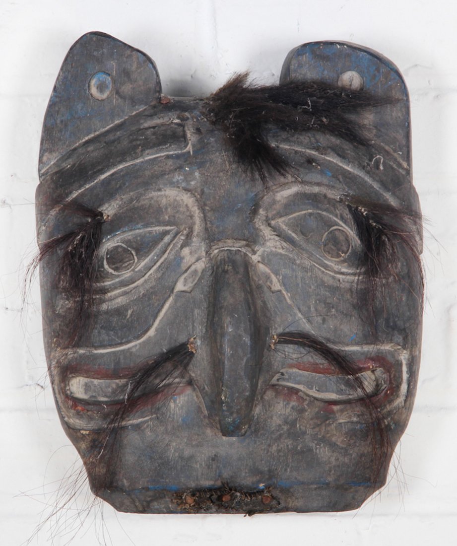 Northwest Coast / Salish Style Totem Mask: Northwest Coast / Salish Style Totem Mask. Carved wood, bristle and fur, remnants of paint. Size: 14" x 11.5" x 5.5". Provenance: William Murray