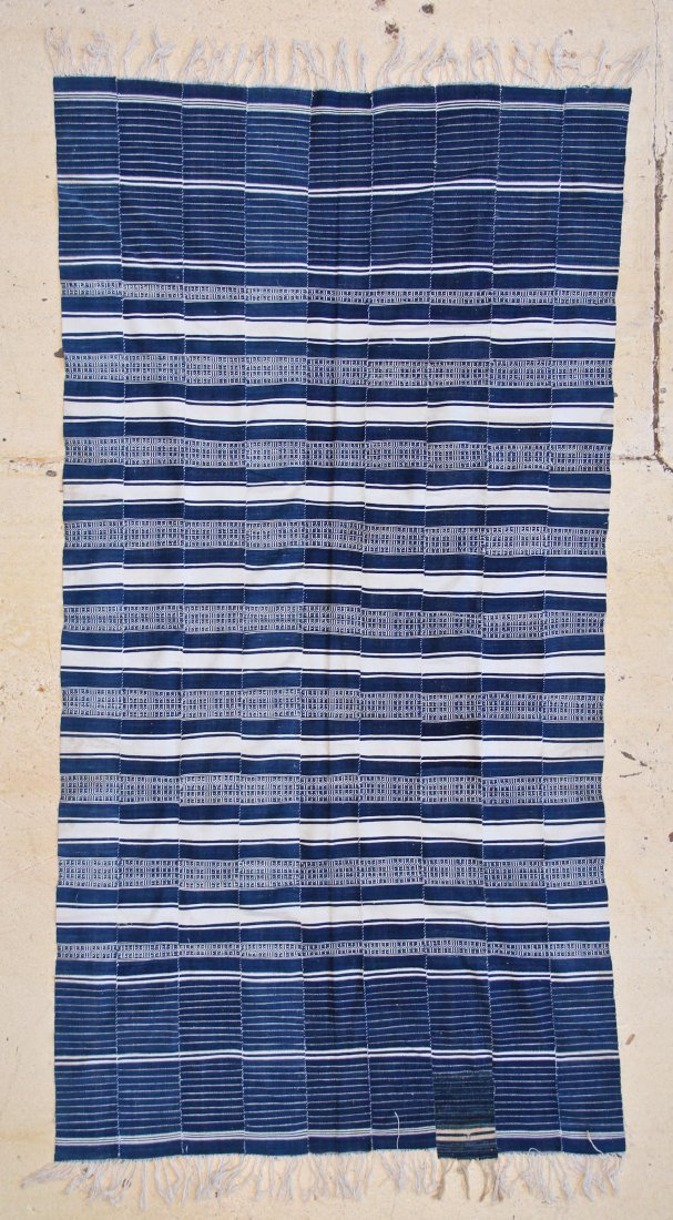 Ivory Coast Strip Woven Blanket: 4'6" x 8'9" (137 x 266: Ivory Coast Strip Woven Blanket, early 20th c, hand spun cotton, indigo dyes, excellent condition. Size: 4'6" x 8'9" (137 x 266 cm). Provenance: Jane Steinsnyder.