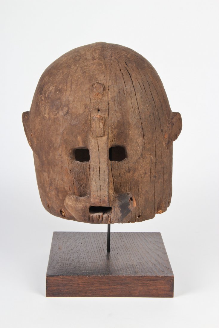 Dogon Helmet Mask: Dogon Helmet Mask, carved wood. African. Size: 16" x 8" x 8". Provenance: ex collection Ben Bernstein; estate of Milton Ginsburg.