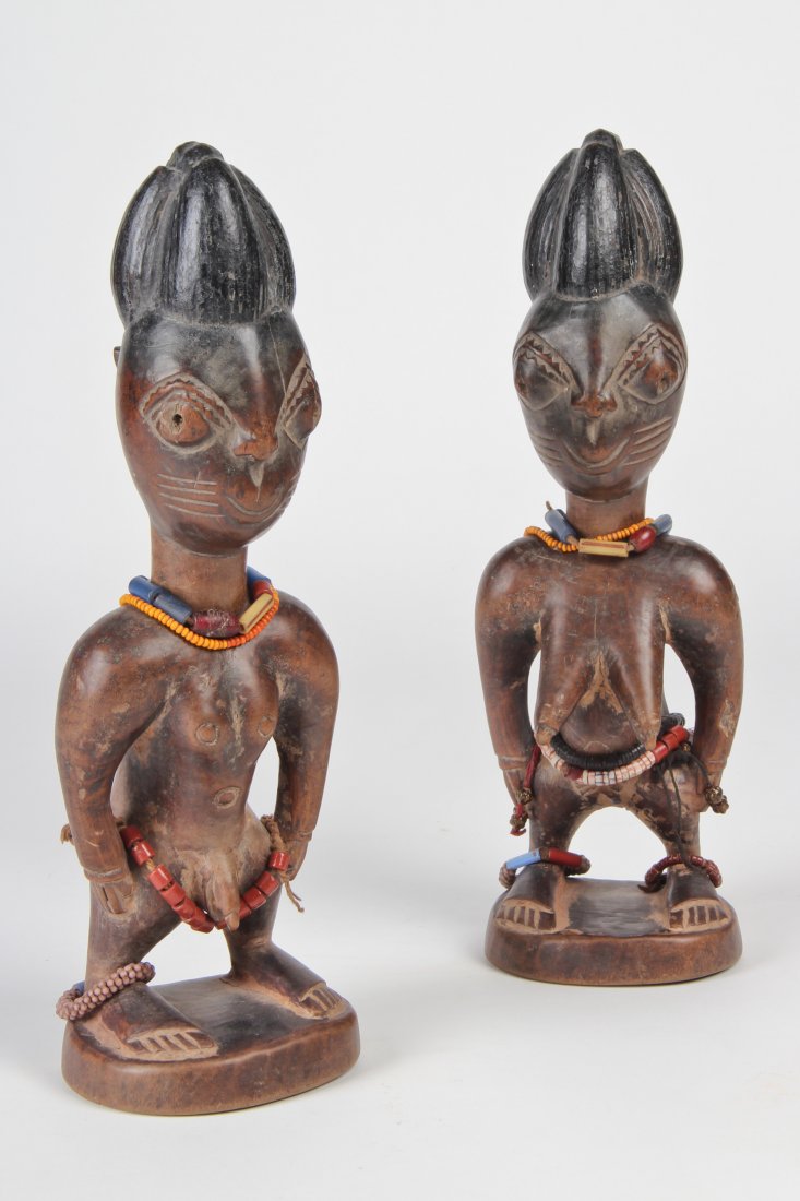 Pair of Fine Ibeji Twins, African: Pair of Fine Ibeji Male/Female Twins, African, carved wood, pigment. Size: 11" x 4" x 3" each. Provenance: ex collection Ben Bernstein; estate of Milton Ginsburg.