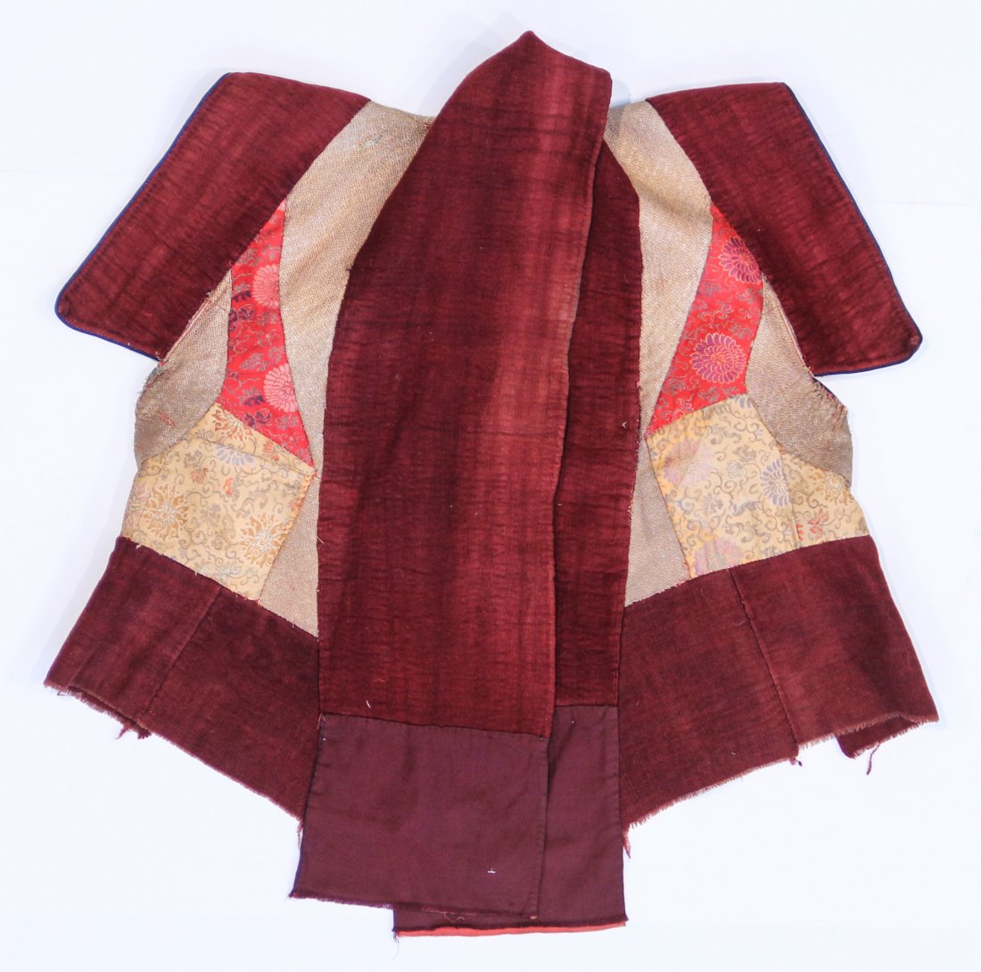 Tibetan Lama's Vest: Tibetan Lama's vest - wool with 18th/19th c. Chinese and Indian pieced silk brocade applique. Size: 33.5" x 31" (85 x 78 cm). Provenance: Bill Liske.