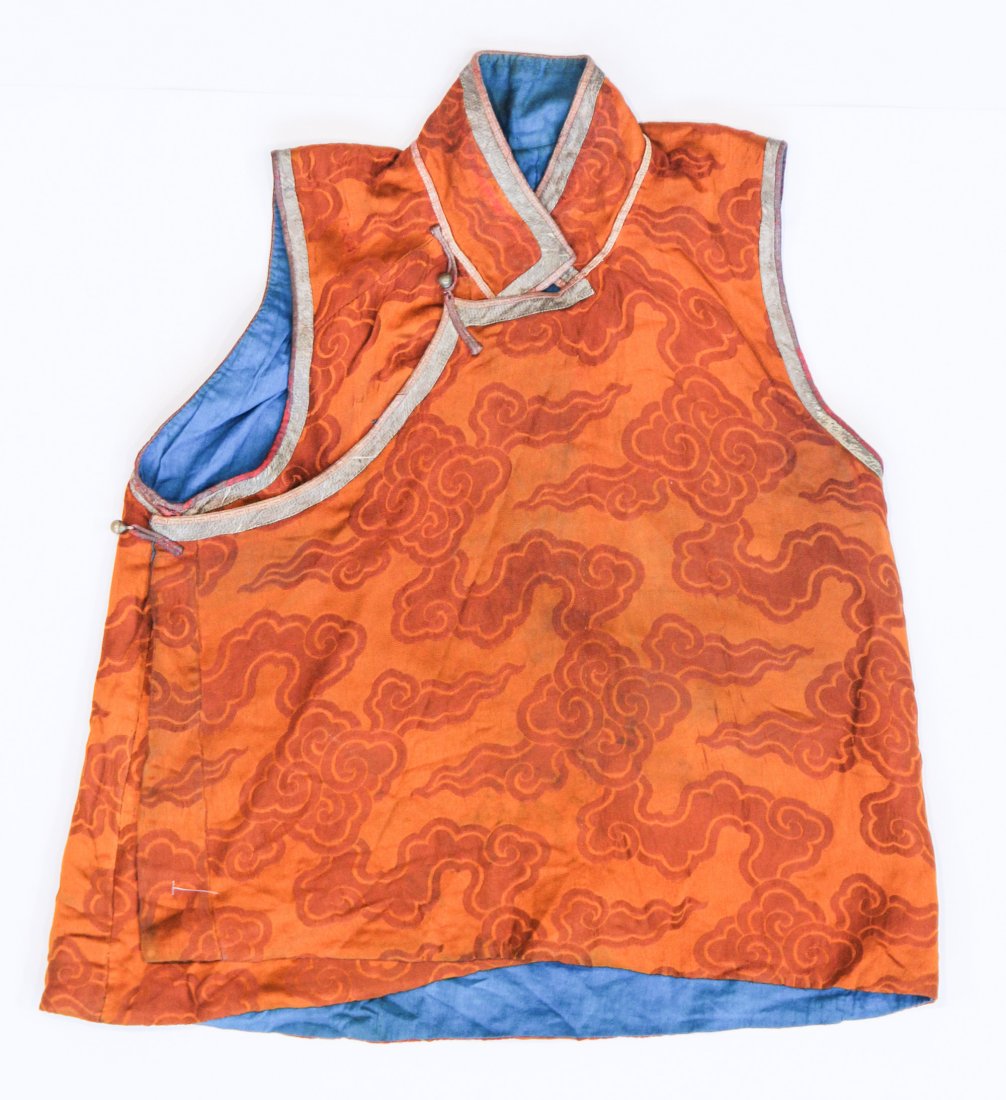 Tibetan High Lama or Tulku's Vest: Tibetan high Lama or Tulku's vest - orange and gold 19th c. Chinese silk brocade. Size: 26" x 23" (66 x 58 cm). Provenance: Bill Liske.