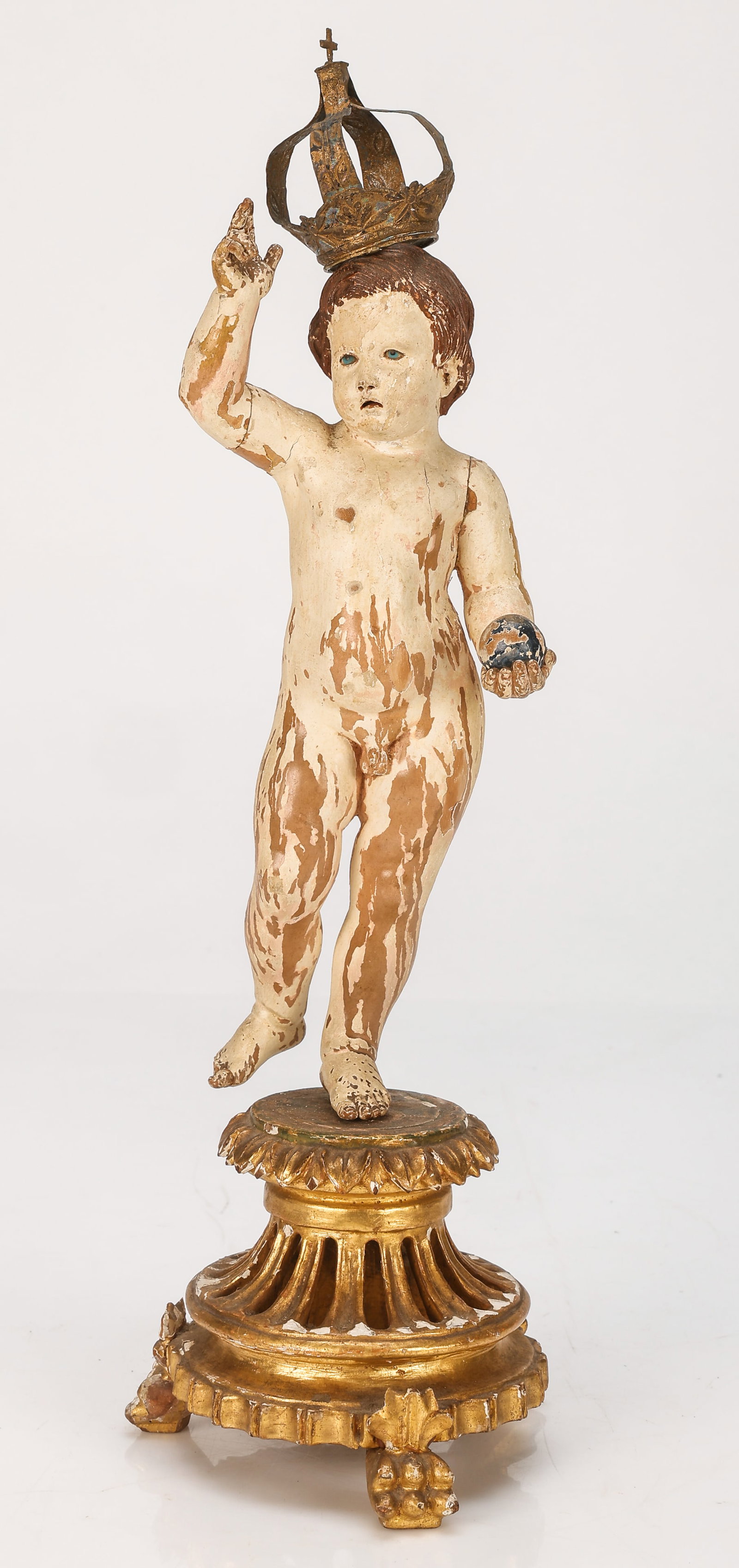 Antique Santo Niño Infant Christ Figure, 18th C., Brazil, Ht. 16": Antique Santo Niño Infant Christ Figure, 18th C., Brazil. Carved polychrome wood, metal crown giltwood base. Size: 16'' x 4.5'' x 4.5'' (41 x 11 x 11 cm).