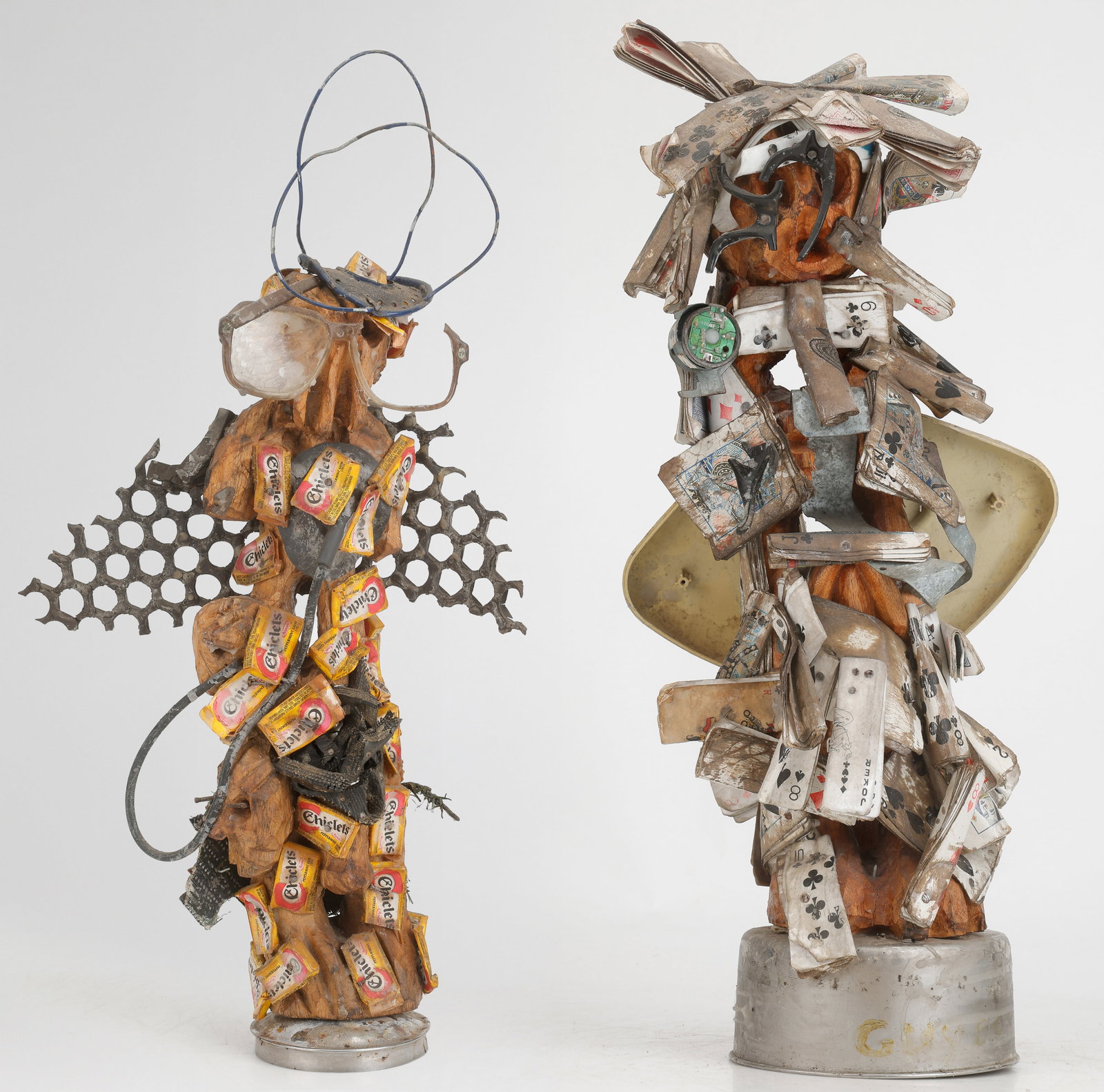 2 Haitian Vodou Sculptures, Mixed Media, H: 21"; 22": 2 Vodou Sculptures, Haiti. 1) St. Michael Archangel Vodou God Ogun, Haiti. Mixed media and found objects sculpture, 2000. Affixed label reads: "Warrior/Protector, Fighting for Justice." Size: 21'' x 1