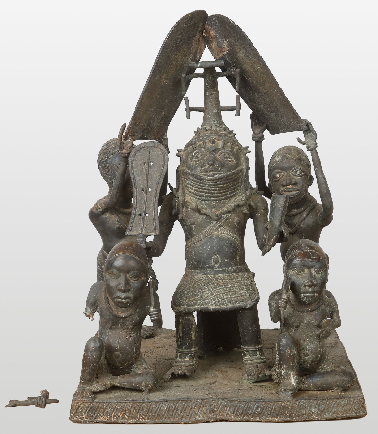 Large Benin Bronze, Depicting A King And Attendants, H: 32": Large Benin Bronze, Depicting A King And Attendants. With Disconnected Fan/Shade Piece. Size: 32'' x 22'' x 22'' (81 x 56 x 56 cm). Weight: 105 lbs. Provenance: Collection of Charles L. Blockson (1933