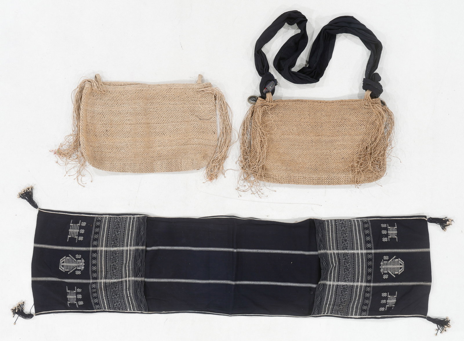 Two Yi Knotted Rope Bags and Dong Saddle Bag: Two Yi Knotted Rope Bags and Dong Saddle Bag. Sizes From: 1'5'' x 1'1'' (43 x 33 cm); To: 4'2'' x 2'1'' (127 x 64 cm). Provenance: From the Niña Sidley Collection of International Textiles and Folk
