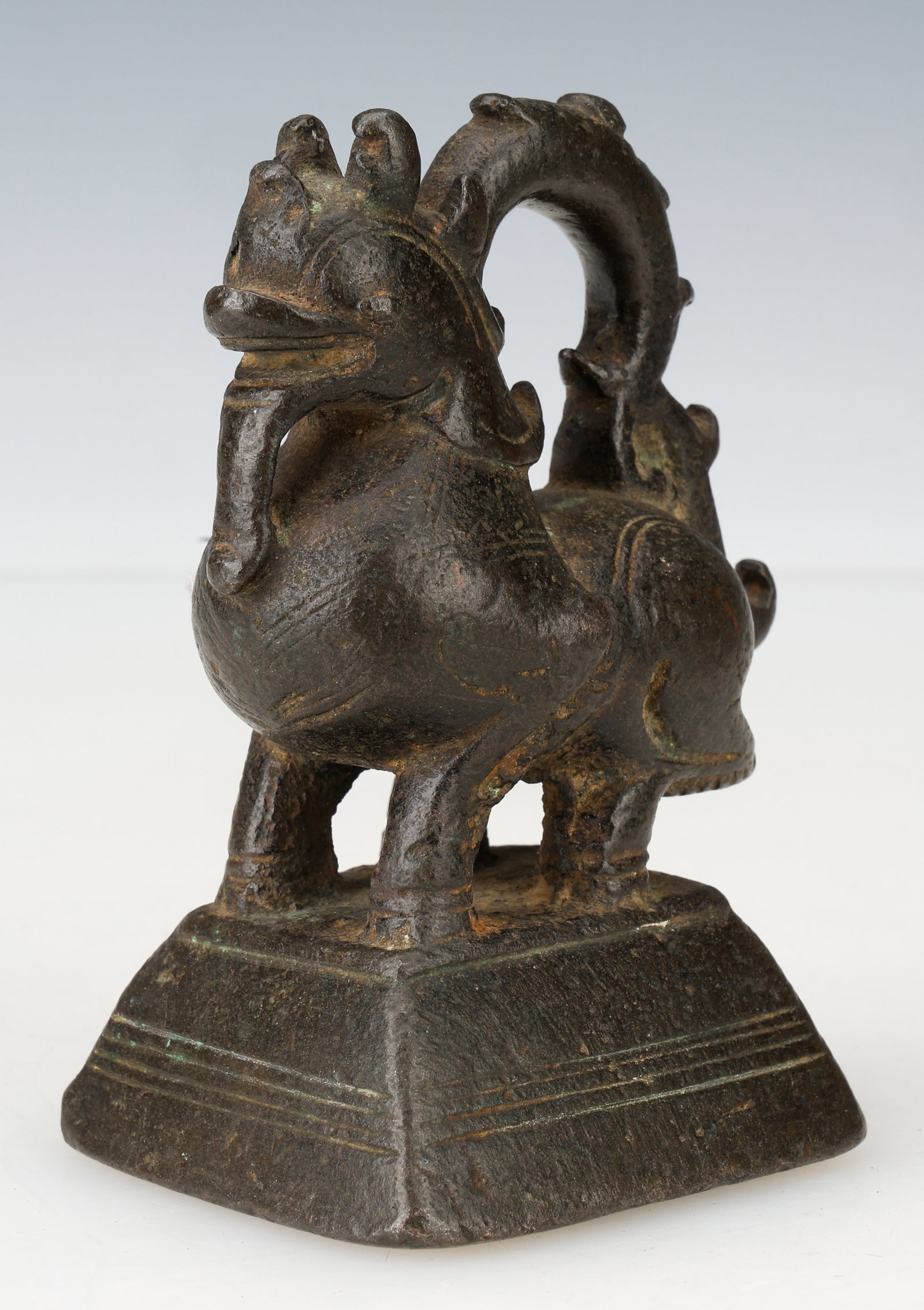 Rare Large Bronze Opium "Beast" Weight, Bodawpaya Kingdom, Burma, Early 19th C. H: 4.5": A rare, quite large opium "beast" weight from the Bodawpaya Kingdom, Burma, 1819-1824. Weight: 1629 grams. Size: 4.5'' x 3.5'' x 2.5'' (11 x 9 x 6 cm).Note the 9-rayed star on the base and the mouth p