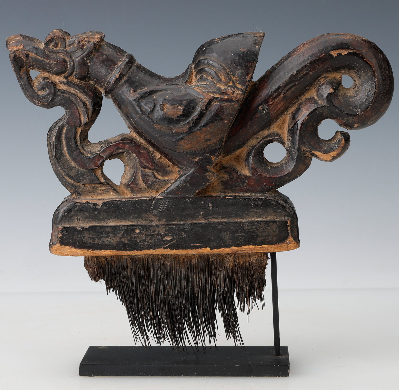 Antique Cambodian Textile Brush, C. 1900, 7" x 8": Antique Cambodia (Kampuchea) Textile Brush, Circa 1900. Size: 7'' x 8'' x 1.5'' (18 x 20 x 4 cm); Hos: 7.5" (19 cm). Handle carved as a highly stylized mythical sacred goose, or Hansa, symbol of purit