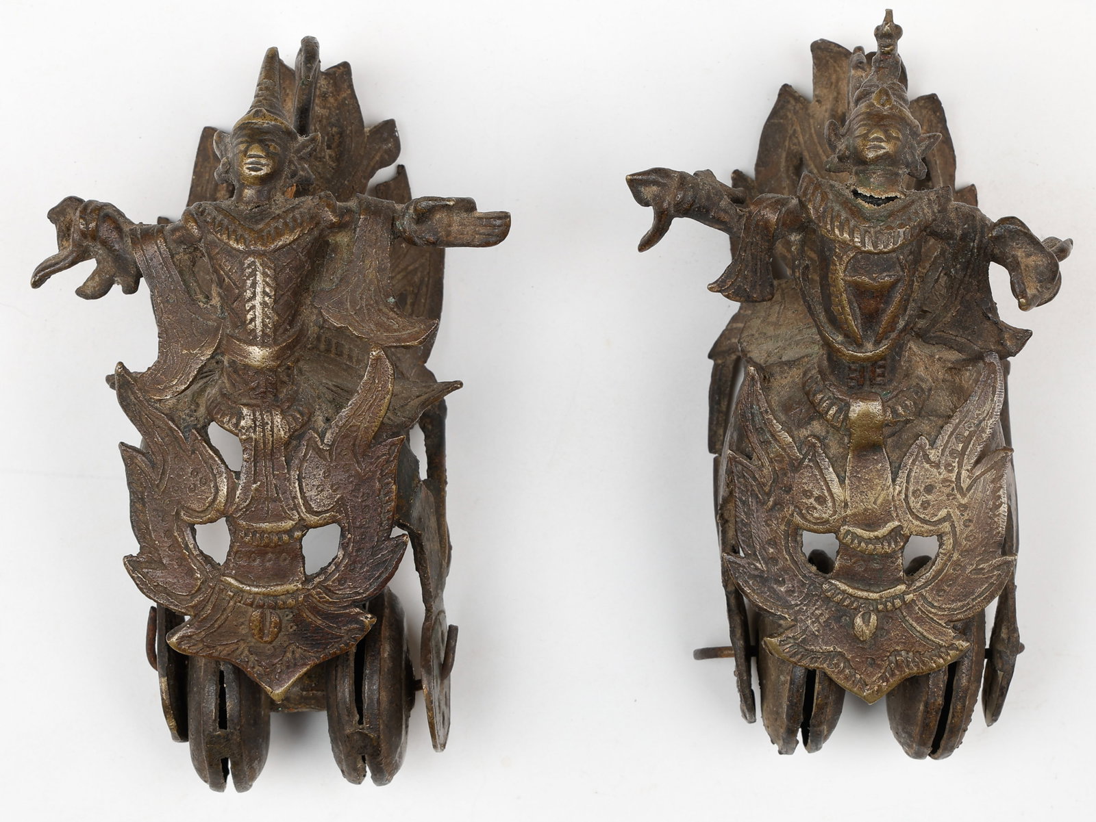 Pair Of Burmese Metal Loom Pulleys, Late 19th C. H: 6": Pair Of Burmese Metal Loom Pulleys, Late 19th C. Size: each 6'' x 3.5'' x 3.5'' (15 x 9 x 9 cm). Each in the shape of Kinnara deity riding on a double-wheel pulley. They would have been suspended from