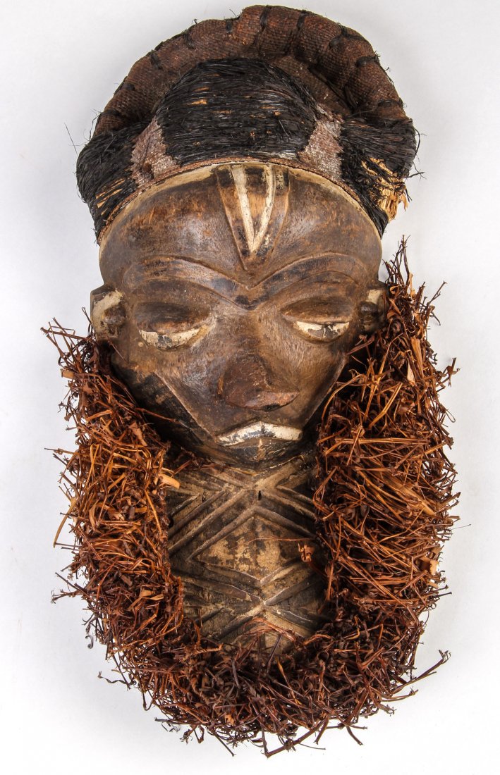 African Pende Mask: African Pende Mask. Carved wood, fiber. Size: 14.5" x 6" x 5". Provenance: Max Garb, Chicago, Illinois.