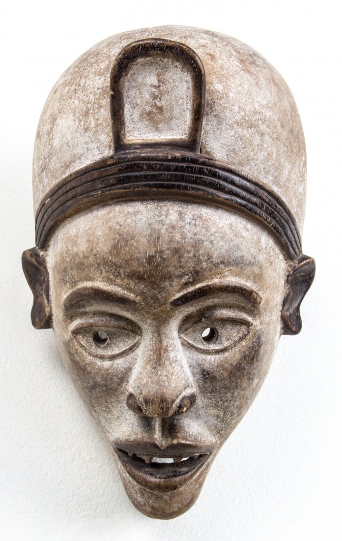 African Kongo Mask: African Kongo Mask. Carved wood, kaolin. Size: 11" x 7" x 6". Provenance: Max Garb, Chicago, Illinois.