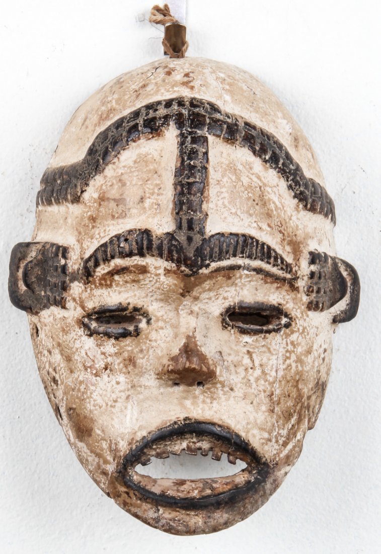 African Kongo Mask: African Kongo Mask. Carved wood. Size: 8.5" x 6" x 4". Provenance: Max Garb, Chicago, Illinois.