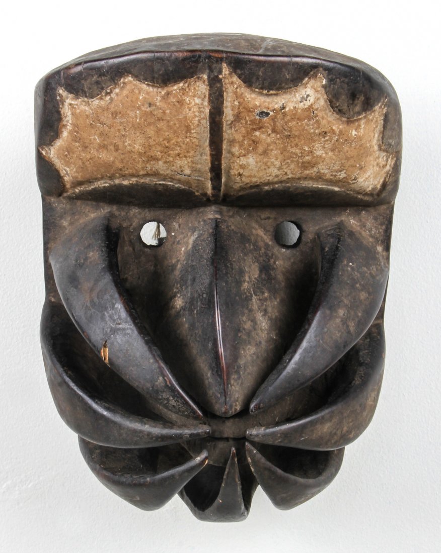 African Bete Mask: African Bete Mask. Carved wood. Size: 12" x 9" x 8". Provenance: Max Garb, Chicago, Illinois.