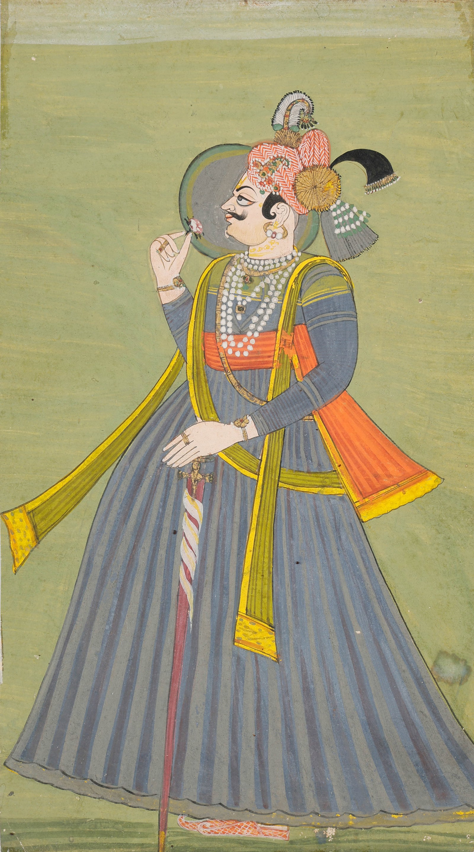 Bikaner Portrait Miniature Of A Rajput Nobleman, Late 18th - Early 19th C.: Bikaner Portrait Miniature Of A Rajput Nobleman Holding A Flower, Late 18th - Early 19th C. Opaque watercolor on paper. Size: 11.25'' x 6.5'', 29 x 17 cm (sheet); 17'' x 14'', 43 x 36 cm (mat). The fi