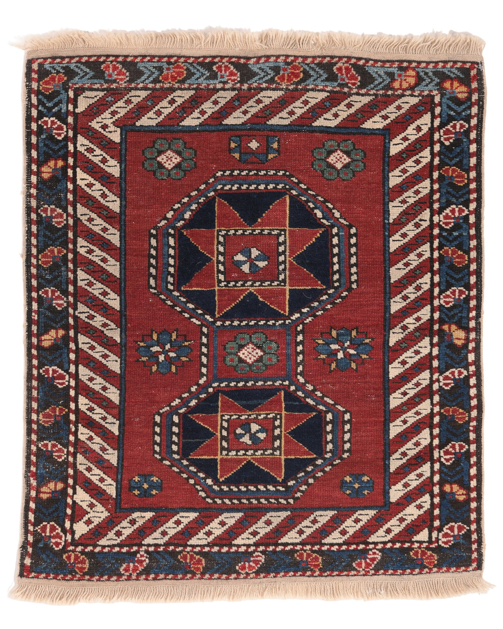 Shirvan Rug, Caucasus, Late 19th C., 2'2'' x 2'7'': Shirvan Rug, Caucasus, Late 19th C., 2'2'' x 2'7'' (66 x 79 cm). Weight: 2 lbs. Material: wool pile, wool warp, wool weft. Both outer guard ends rewoven.