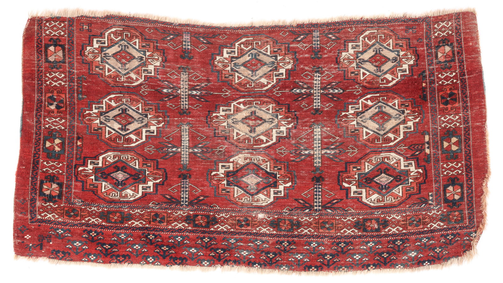 Saryk Chuval (fragment), Central Asia, 19th C., 4'2" x 2'2": Saryk Chuval (fragment), Central Asia, 19th C., 4'2" x 2'2". Woven with white cotton and an asymmetric knot, this piece, though within the parameters of a Saryk attribution, it seems related to the Sa