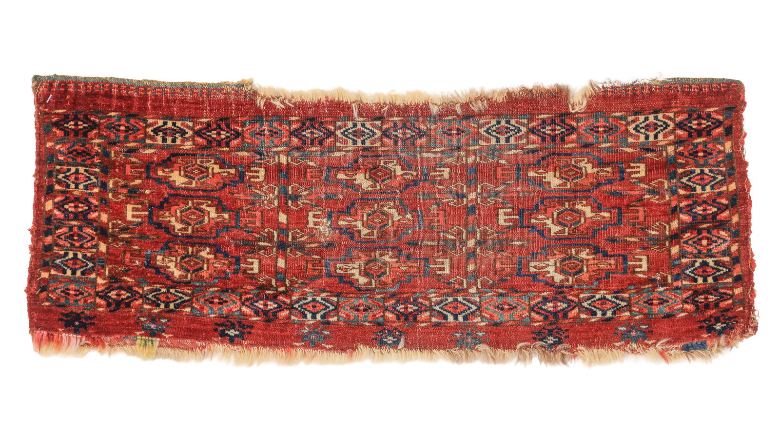Tekke Mafrash, Central Asia, 19th C., 2'5" x 10": Tekke Mafrash, Central Asia, 19th C., 2'5" x 10". The typically precise hand of the Tekke weaver is, for the most part, absent here. The small gols vary noticeably-some elongated, others more compact,