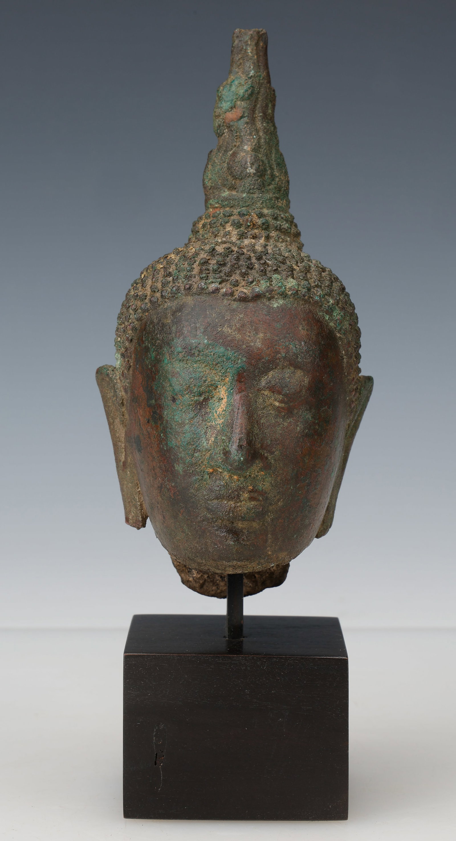 Thai Sukhothai Bronze Head of Shakiamuni, Buddha, Thailand, Circa. 14th-15th C.: Thai Sukhothai Bronze Head of Shakiamuni, Buddha, Thailand, Circa. 14th-15th C. On stand. Size: 7'' x 3.5'' (18 x 9 cm); HOS: 8.5'' (22 cm). Purchased in 2015 from James Stephenson African Art, Brookl
