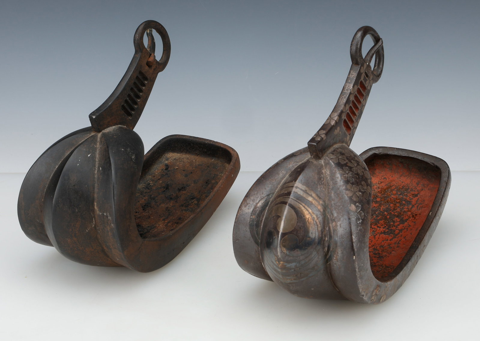 2 Antique Japanese Iron Stirrups (Abumi), Edo Period: 2 Antique Japanese Iron Stirrups (Abumi), Edo Period. One with silver inlay, signed: Masashige. Each Size: 9.5'' x 11'' x 15'' (24 x 28 x 38 cm). Provenance: Private Philadelphia Estate Collection; Pe