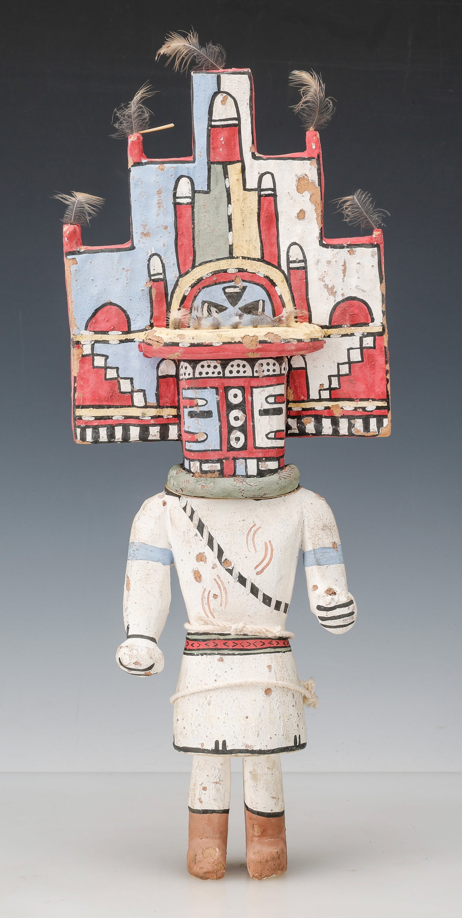 Hopi Hemis Katsina Doll, Arizona, Early-Mid 20th C. H:16": Hopi Hemis Katsina Doll, Arizona, Early-Mid-20th C. Carved wood root, pigments and applied feathers. With an elaborate stepped tablita headdress decorated in red, white, black, and pale blue geometric