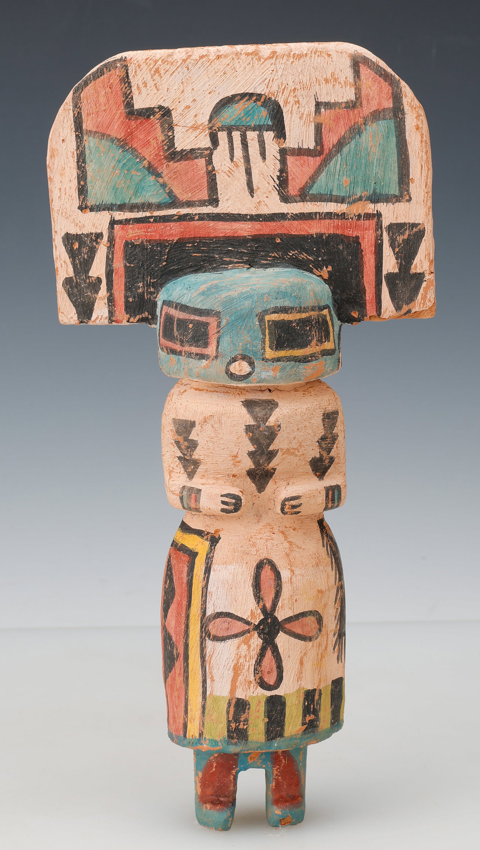 Vintage Hopi Polik Mana Kachina Doll, Mid 20th C., H: 12": Vintage Hopi Polik Mana Kachina Doll, Mid 20th C.Carved wood figure depicting a female katsina with broad tablita headdress decorated in stepped cloud and geometric motifs. Retaining original polychro