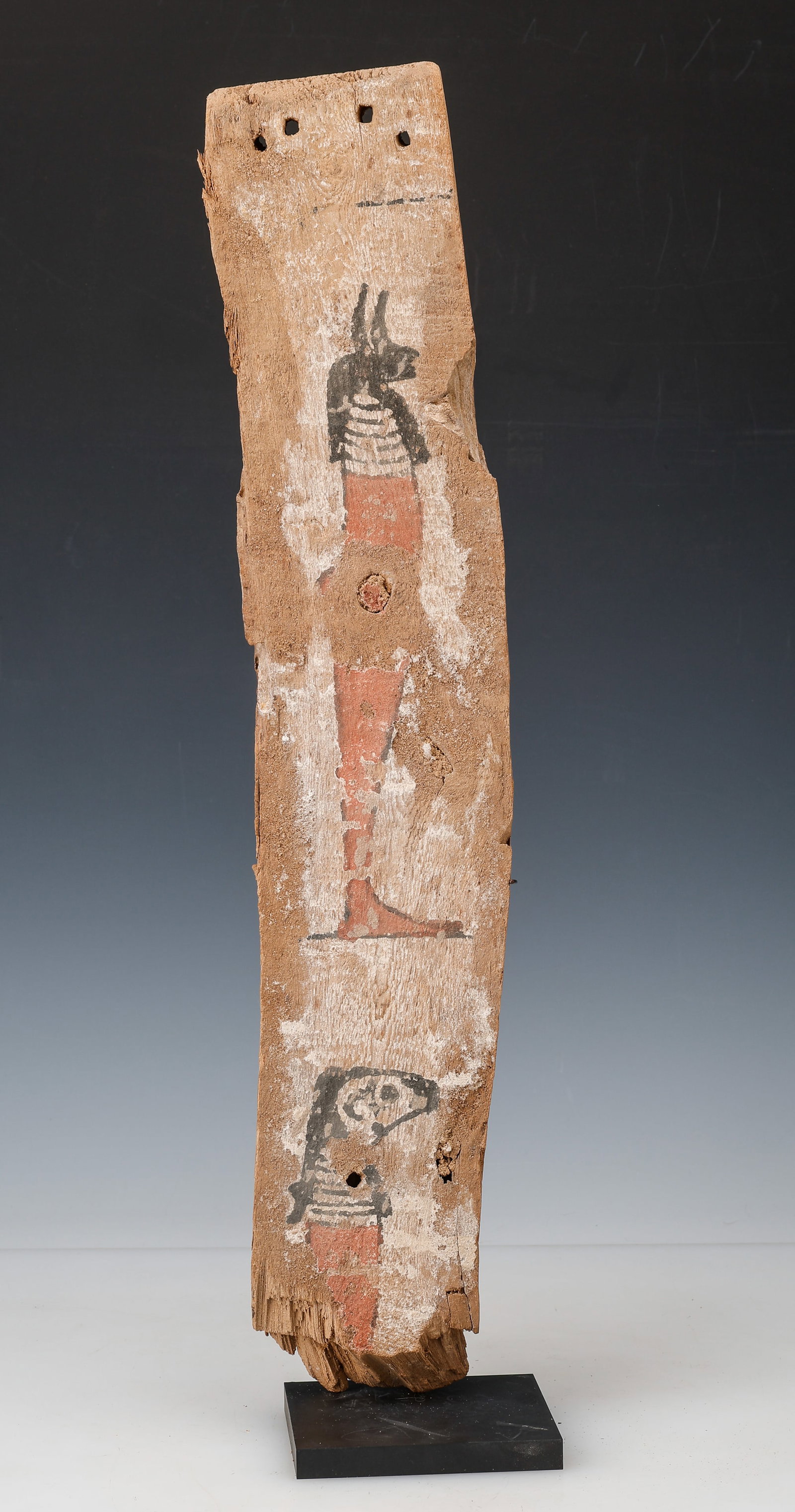 Egyptian Polychrome Wood Sarcophagus Panel Fragment, H: 20.5": Egyptian Polychrome Wood Sarcophagus Panel Fragment, C. 664-332 BC. On stand. Size: 20.5'' x 4'' x 1'' (52 x 10 x 3 cm); HOS: 21.5'' (55 cm). Provenance: NYC Coll.