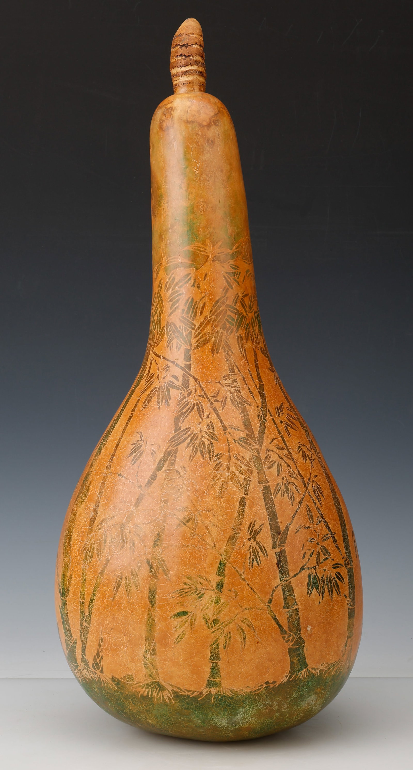 Michael Harburg (American/Hawaiian, 20th/21st C.)Large Hawaiian Ni'ihau-Method Decorated Ipu Gourd: Exceptional contemporary Hawaiian carved and dyed ipu gourd vessel by noted Hawaiian gourd artist Michael Harburg, executed in the traditional Ni'ihau method. Size: 24'' x 9'' (61 x 23 cm). The large 