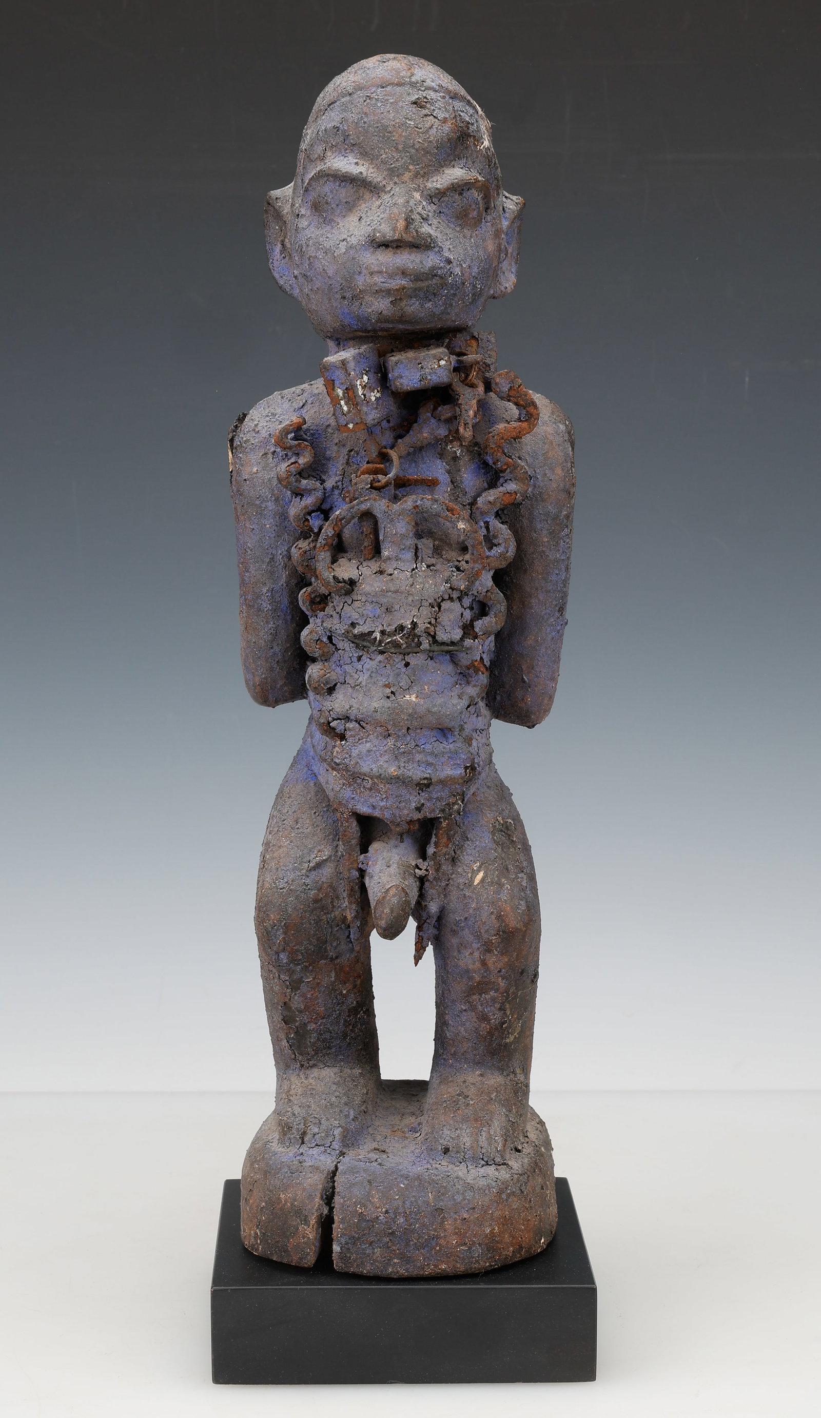 Fon Or Igbo Bocio Shrine Fetish Figure, Ex. Michael Oliver, H:16.75": Fon Or Igbo Bocio Shrine Fetish Figure. Carved wood, metal, pigment. On associated stand. Height: 16.75" (43 cm); HOS: 18" (46 cm).. Ex. Michael Oliver.