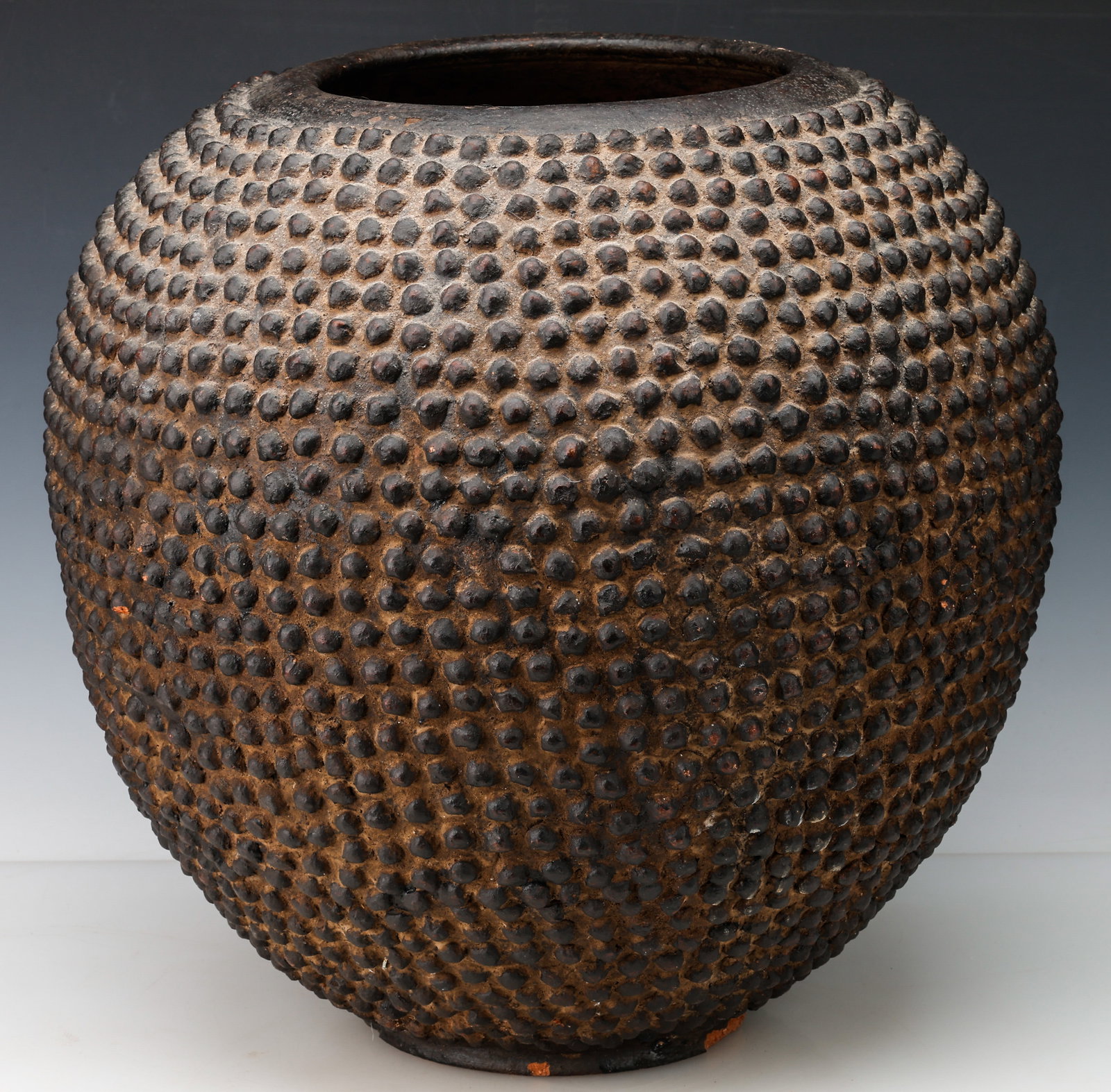 Lobi Beer Fermentation Floor Pot, Burkina Faso, 20th C., H: 17": Lobi Beer Fermentation Floor Pot, Burkina Faso, 20th C. Earthenware. Size: 17'' x 15'' x 15'' (43 x 38 x 38 cm).