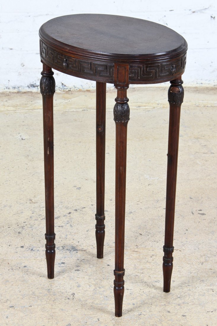 Diminutive Neo-Classical Candle Stand: Diminutive Neo-Classical Candle Stand. Greek key and bell flower details. Detached lower shelf. Size: 28" x 15.75" x 12".