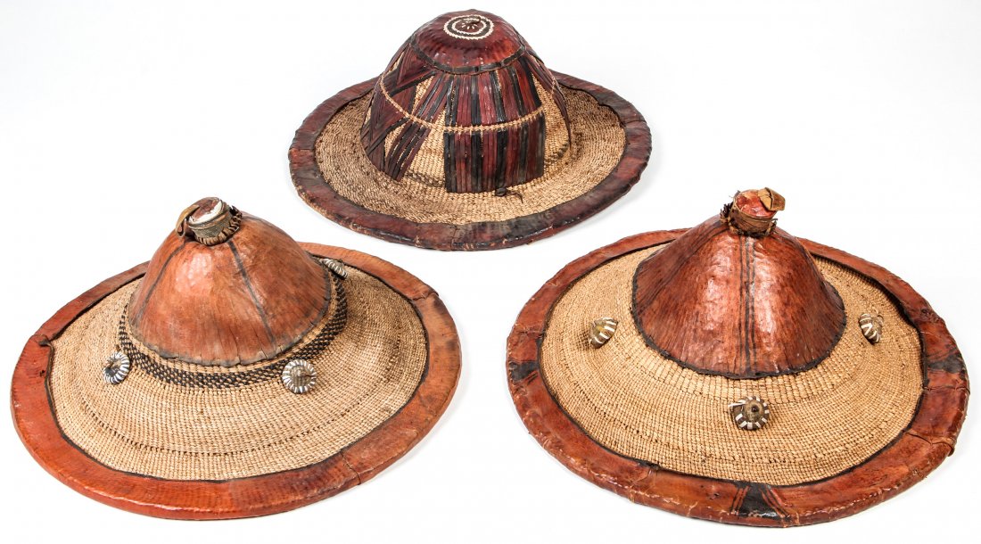 Three Vintage Tuareg Hats, Mali: Three Tuareg Hats, Mali. Ranging in Size From: 6.5" x 15" x 15" to 8" x 16" x 16".