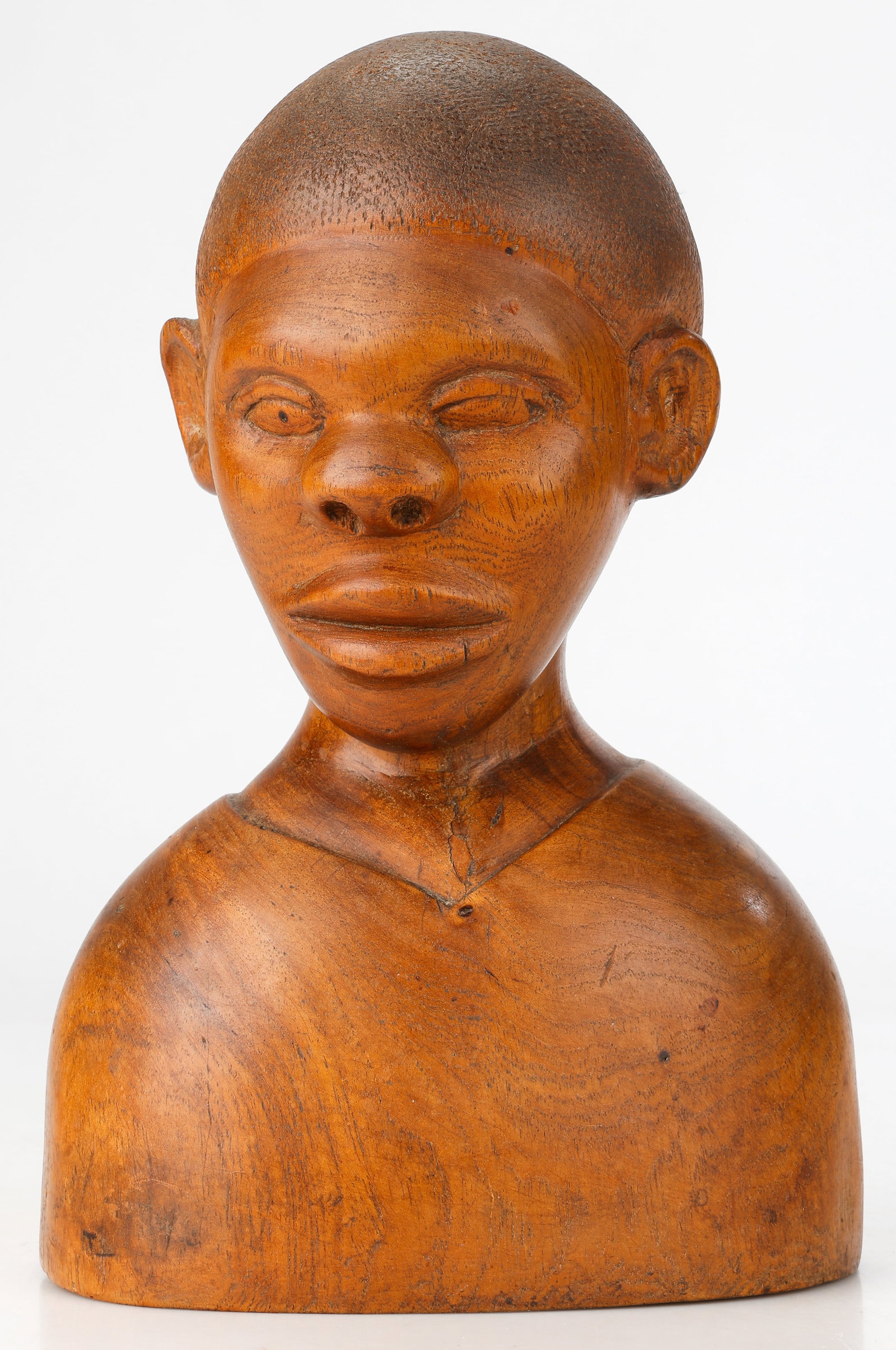 Mallica 'Kapo' Reynolds (Jamaican/Jamaica) Ivan, 1966: Mallica 'Kapo' Reynolds (Jamaican, 1911-1989) Ivan, dated 1966, wood carved bust from one piece of indigenous exotic hardwood, signed, dated and titled on underside. Size: 13.5'' x 9'' x 5'' (34 x 23 