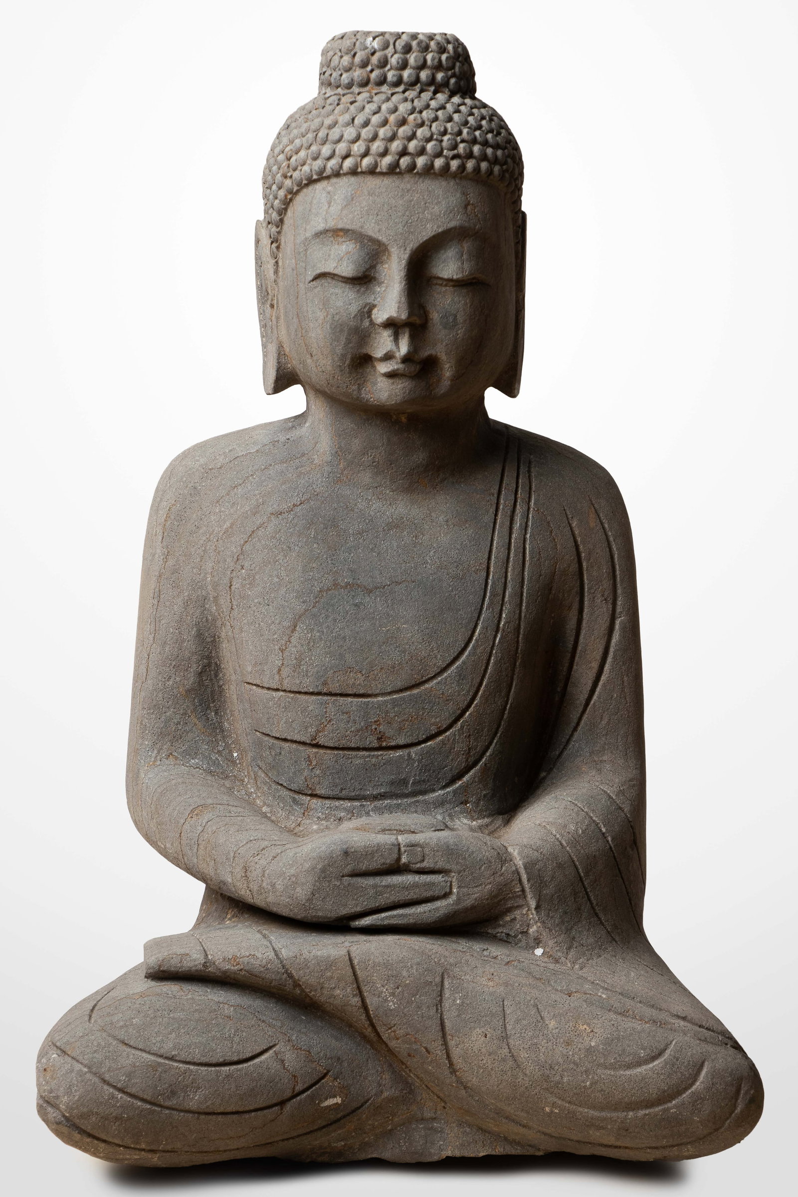 Chinese Carved Stone Buddha Garden Statue, H: 25": Chinese Carved Stone Buddha Garden Statue. Height: 25" (64 cm). After making payment, all furniture buyers must collect and remove their purchases from Material Culture's facility within 2 weeks of th