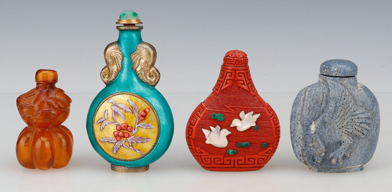 4 Chinese Snuff Bottles: 4 Chinese Snuff Bottles. Including: 1) Chinese carved orange resin gourd snuff bottle with matching stopper. 2) Chinese blue and yellow painted enamel on metal snuff bottle with floral motif. 3) Chine