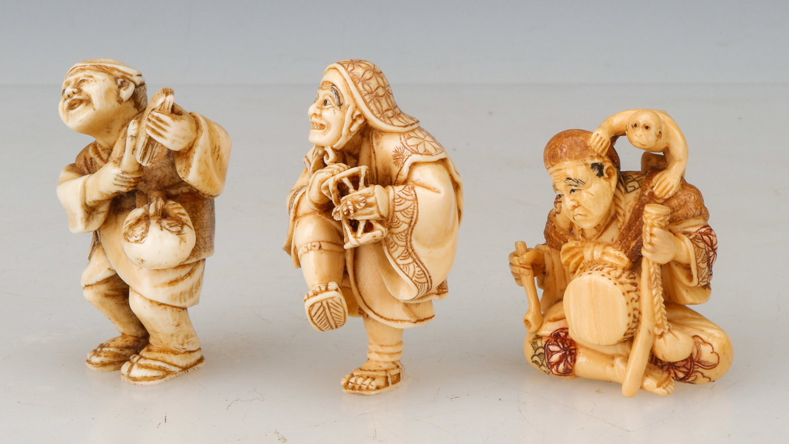 3 Antique Signed Japanese Netsukes of Musicians And Dancer: 3 Antique Signed Japanese Netsukes of Musicians And Dancer. Heights From: 1.75" (4 cm); To: 2" (5 cm).
