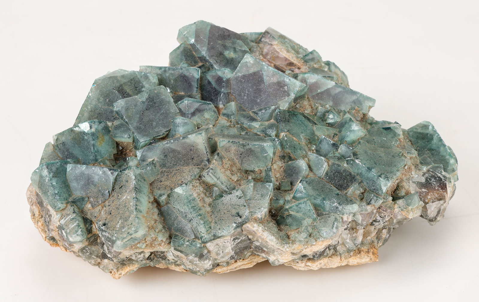 Green Fluorite Crystal Cluster: Green Fluorite Crystal Cluster. Size: 4.5'' x 12'' x 9.5'' (11 x 30 x 24 cm). Approx Weight: 4300 g.