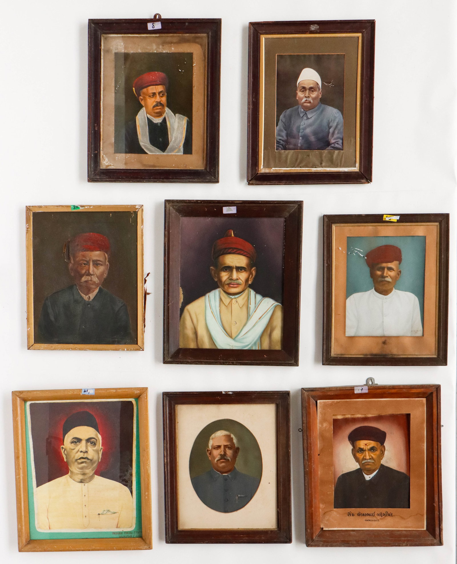 8 Indian Hand-Colored Portrait Photographs, L: 20"-22": 8 Indian Hand-Colored Portrait Photographs. Mixed media, opaque watercolor and/or overpainted photographic process on paper or board. Sizes From: 20'' x 16'', 51 x 41 cm (sight); 22'' x 18'', 56 x 46 