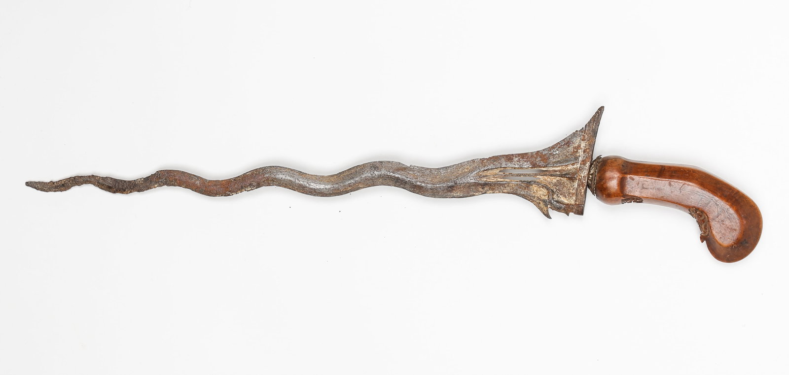 Antique Kris (Keris) Dagger, Java, 19th C. Or Earlier: Antique Kris (Keris) Dagger, Java, 19th C. Or Earlier. Hand-forged wave-type pamor blade symbolizing the naga in motion; carved kemuning wood handle. Size: 15.5'' x 2.5'' x 1'' (39 x 6 x 3 cm).