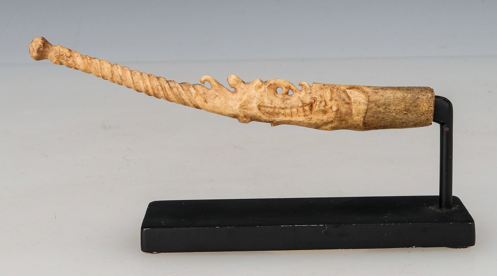 Antique Dayak Betel Knife Finial: Antique Dayak Betel Knife Finial. Size: 4'' x .5'' (10 x 1 cm); HOS: 1.5'' (4 cm). Provenance: Ex- private collection of Ami Brown. Mr. Brown was the owner of the Coca Cola franchise in Israel and ama