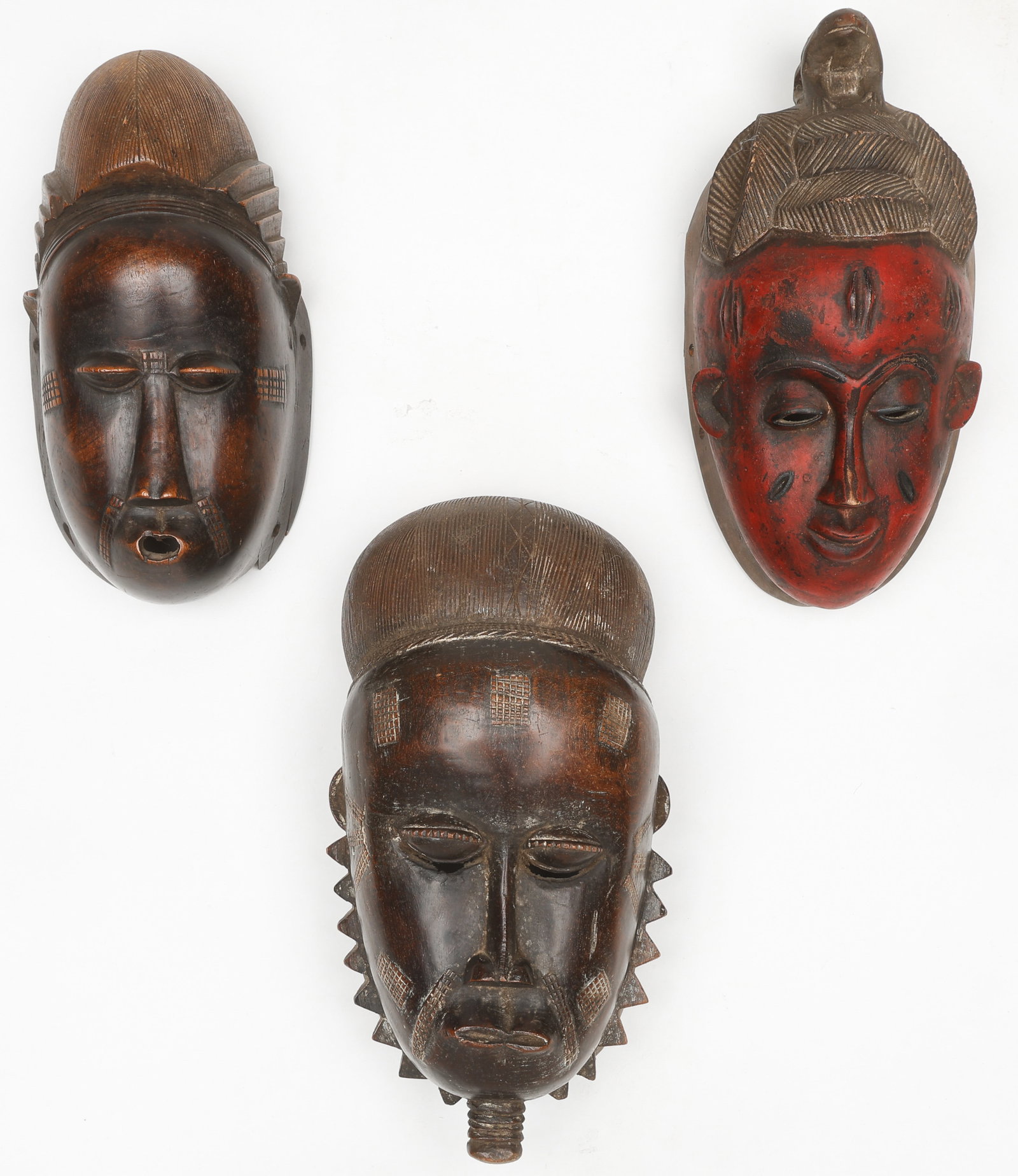 3 African Baule Masks, Cote d'Ivoire: 3 African Baule Masks, Cote d'Ivoire. Carved wood. Sizes: 1) 10.5'' x 5.5'' x 4'' (27 x 14 x 10 cm); 2) 11.5'' x 5.5'' x 3.5'' (29 x 14 x 9 cm); 3) 12'' x 6.5'' x 5'' (30 x 17 x 13 cm). Provenance: Ed