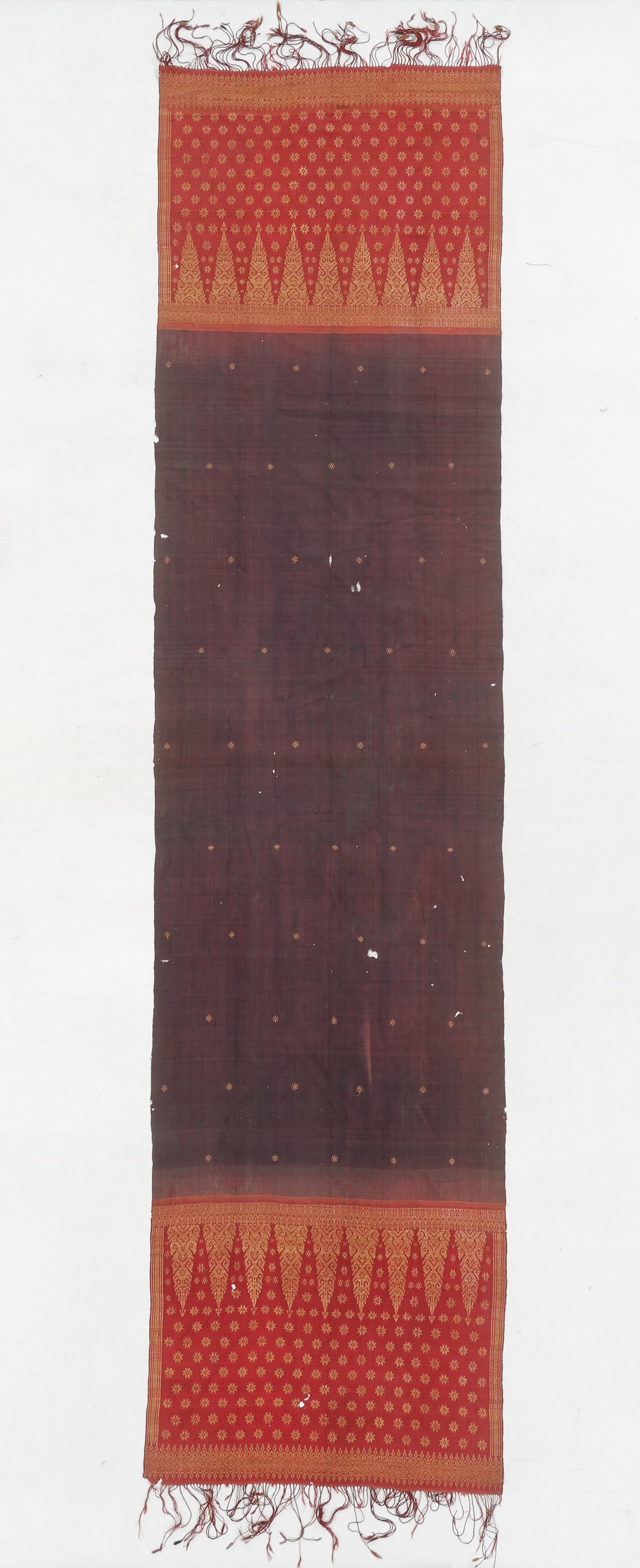 Antique Minangkabau Silk Selendang, Tanah Datar District, Sumatra, Indonesia: Antique Minangkabau Silk Selendang, Tanah Datar District, Sumatra, Indonesia. Size: 2'2'' x 9'0'' (66 x 274 cm). Silk. Decorated with an unusual motif on the end panels of rounded or spiraling tumpal 